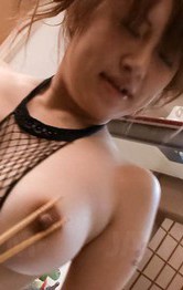 Madoka Ayukawa Asian gets vibrator on peach over fishnet outfit