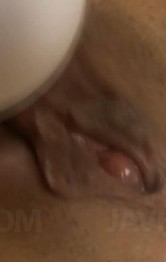 Ai Yuumi Asian fucks her pussy with finger and puts vibrator on